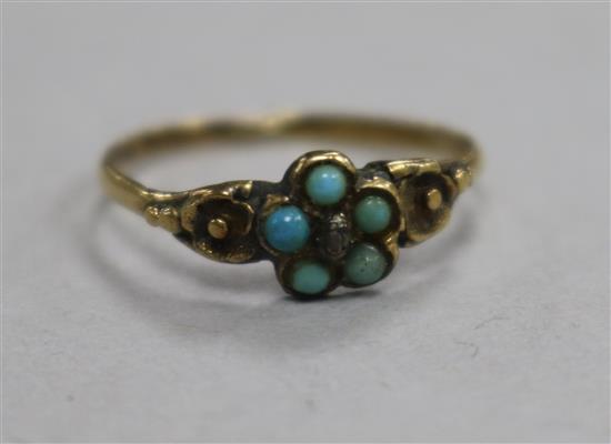 A small Victorian yellow metal and turquoise ring, size K.